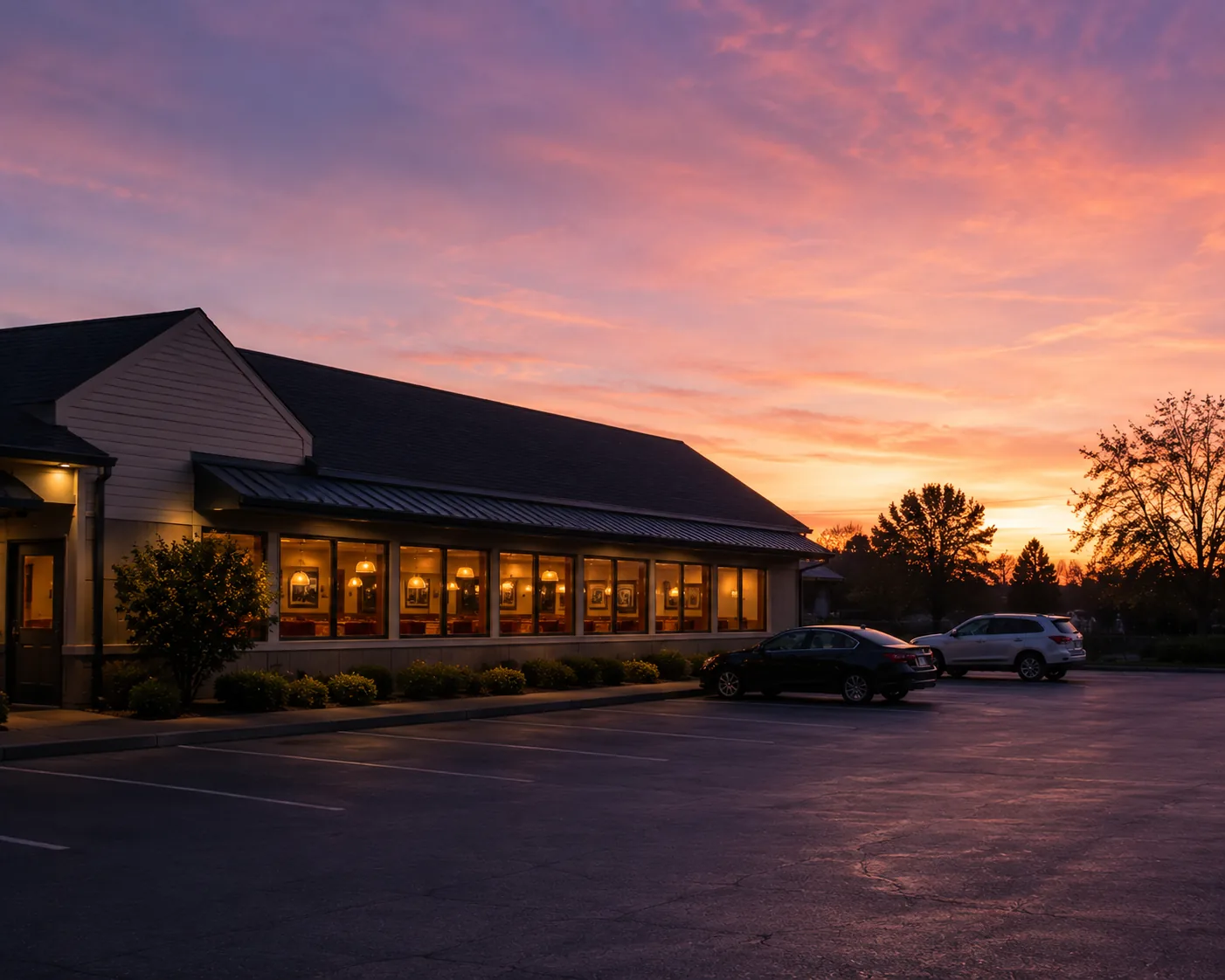 Diner parking lot at early dawn, related to IHOP opening hours and early breakfast service