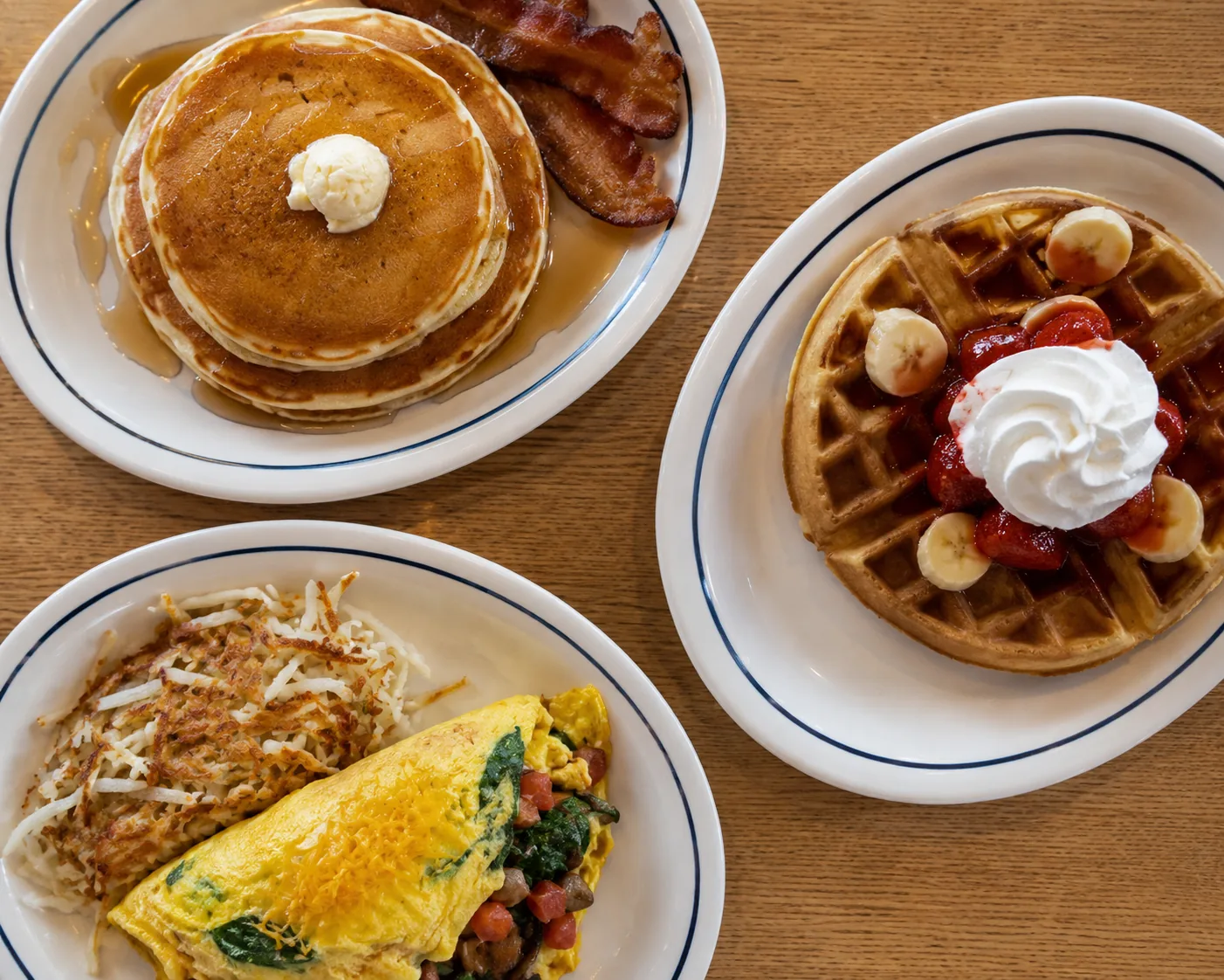 Three breakfast plates representing variety, comparing IHOP, Denny's, and Waffle House